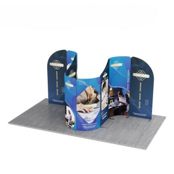 Curved display booth with tall graphic panels on gray flooring