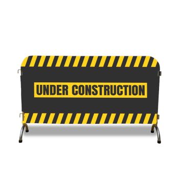 Crowd control barrier cover under construction graphic for safety events