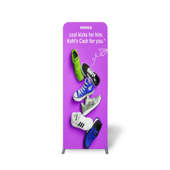 Custom fabric banner stand with a promotional Tropicana graphic.


