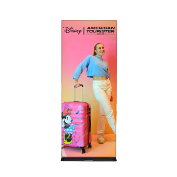 Portable banner stand with energy drink design and vibrant red background